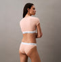 Calvin Klein ICON COTTON Womens T-Shirt Bralette Melon Frenzy back view model wearing bralette with CK elastic waistband.