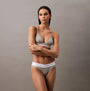 Calvin Klein BIKINI Brief Womens Cotton Modal Stretch Rib Grey side view of model wearing grey bikini briefs and bra.