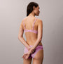 Calvin Klein UNLINED TRIANGLE Sensual Stretch Lace Pink back view on model showcasing delicate lace design.