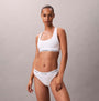 Calvin Klein Icon Cotton Modal Womens Unlined Bralette White front view model wearing bralette with matching underwear