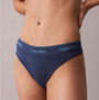 Calvin Klein Icon Cotton Modal Womens Thong Denim side view showcasing the soft fabric and logo waistband.