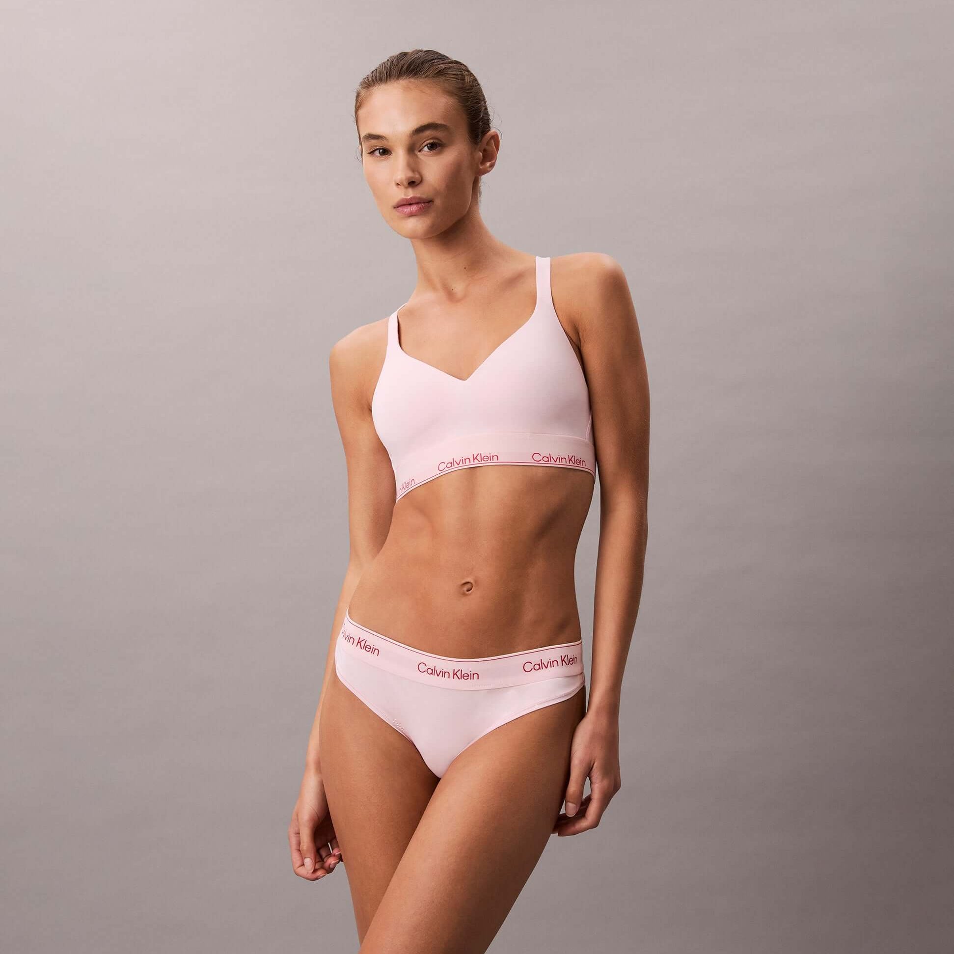 Calvin Klein Icon Cotton Modal Womens Thong Pink side view model wearing pink thong and bralette