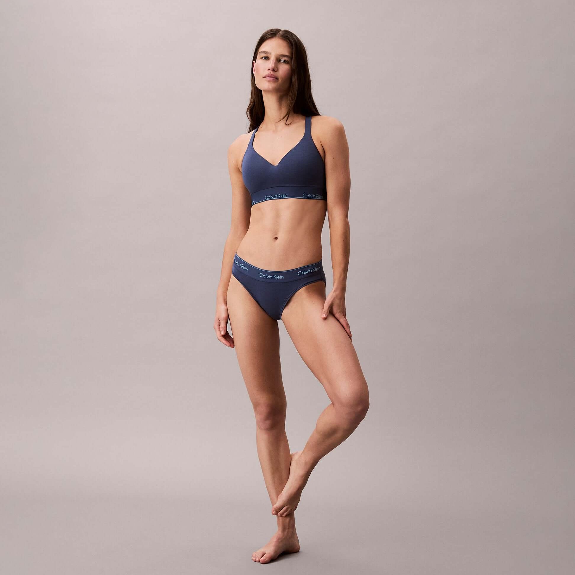 Calvin Klein Icon Cotton Modal Womens Bikini Brief Denim side view on model showcasing regular fit and design details.