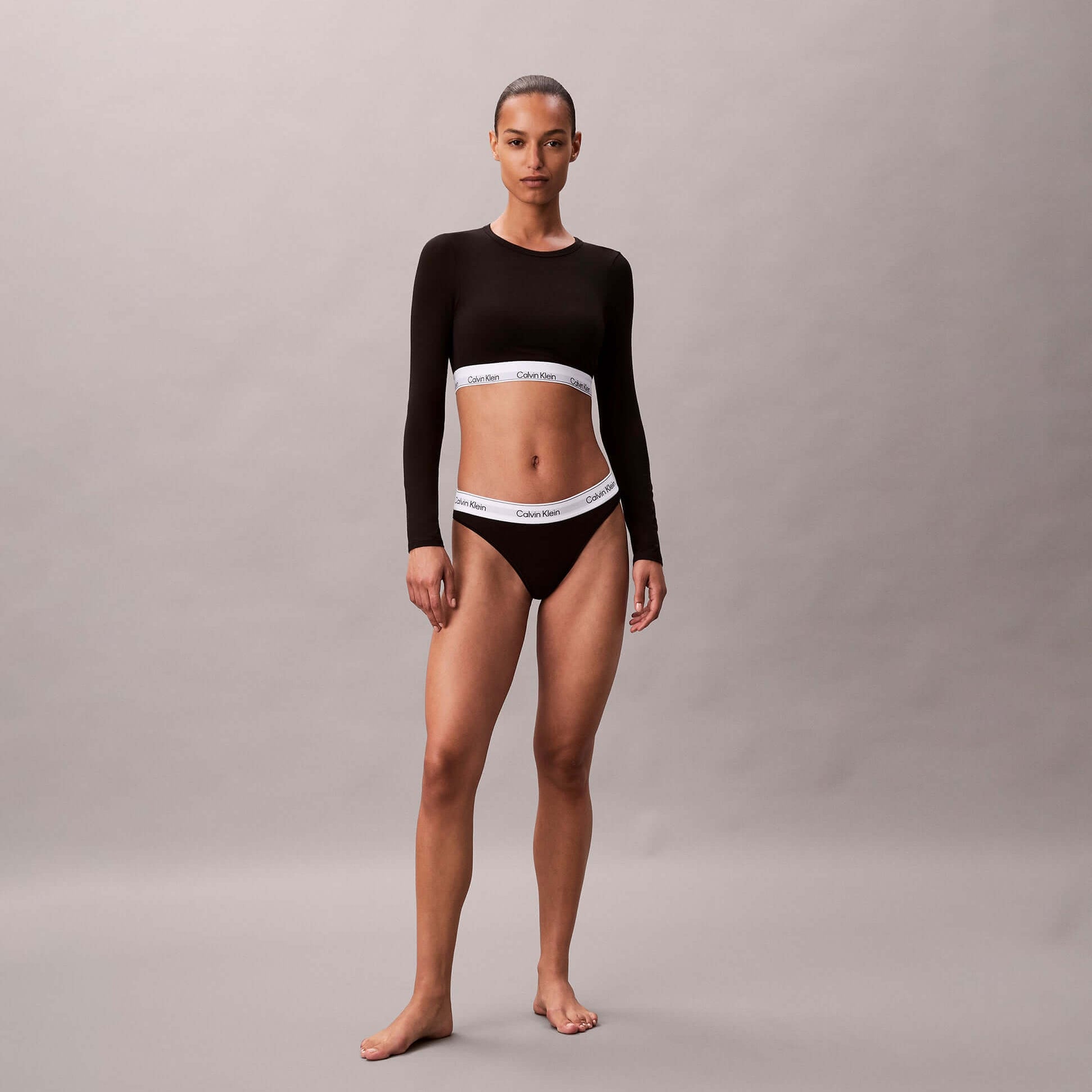 Calvin Klein Icon Cotton Modal Womens Long Sleeve T-shirt Bralette Black front view on model showcasing fit and style.