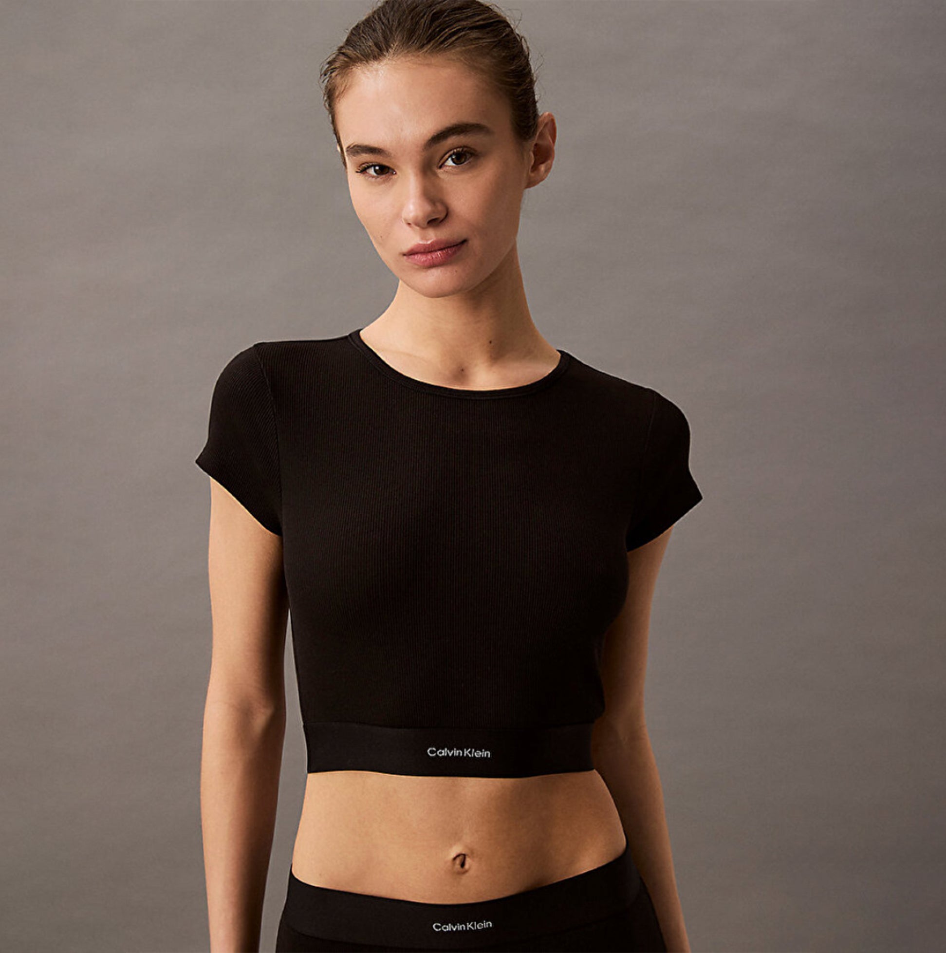 Calvin Klein COTTON STRETCH RIB Womens Crop Top Black front view, featuring fine ribbed texture and crew neckline.
