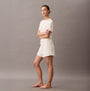 Calvin Klein ULTRA SOFT MODAL Womens Lounge Shorts Ivory side view model wearing comfortable shorts in soft fabric.