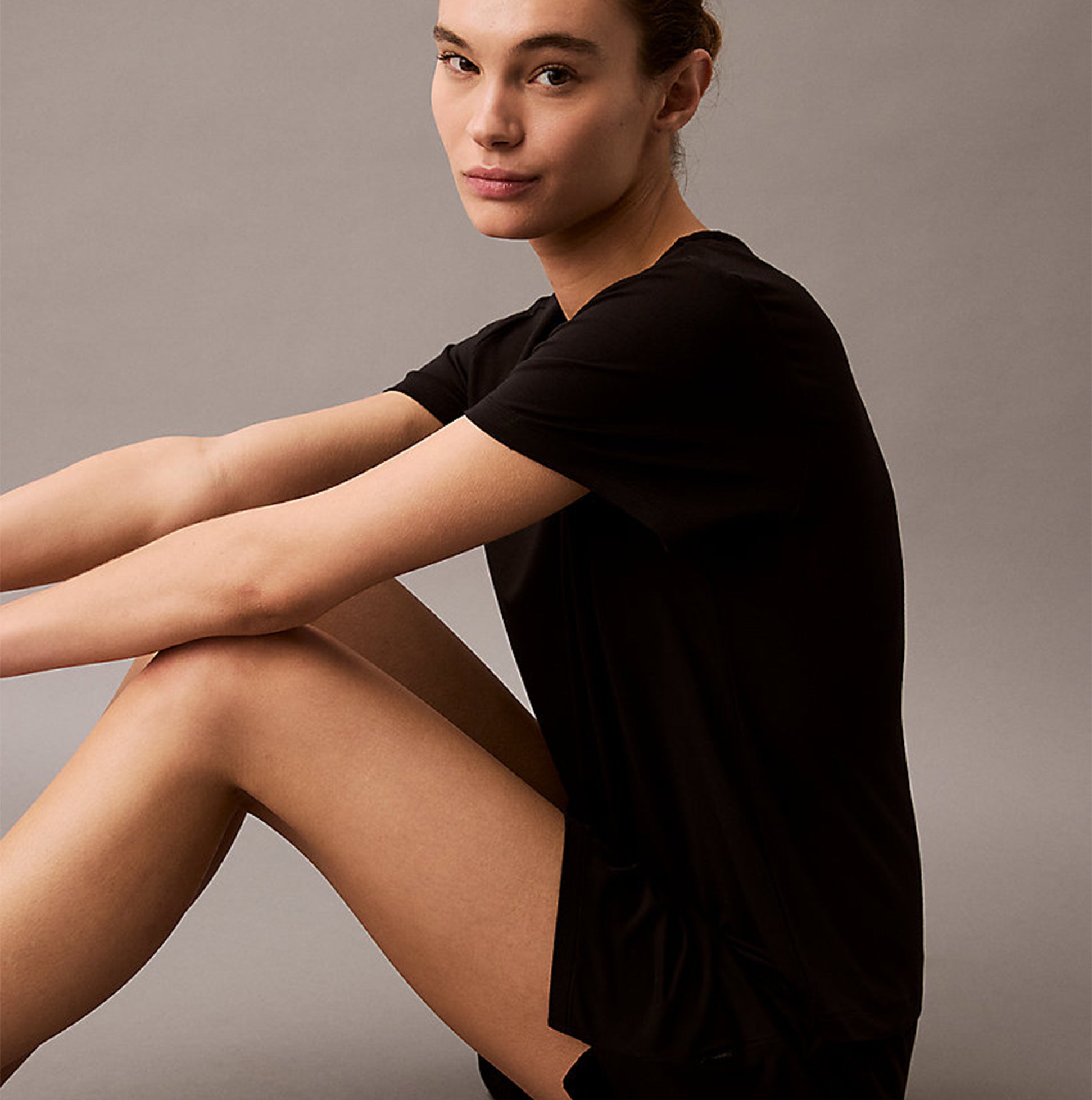 Calvin Klein ULTRA SOFT MODAL Womens Lounge T-Shirt Black front view model sitting