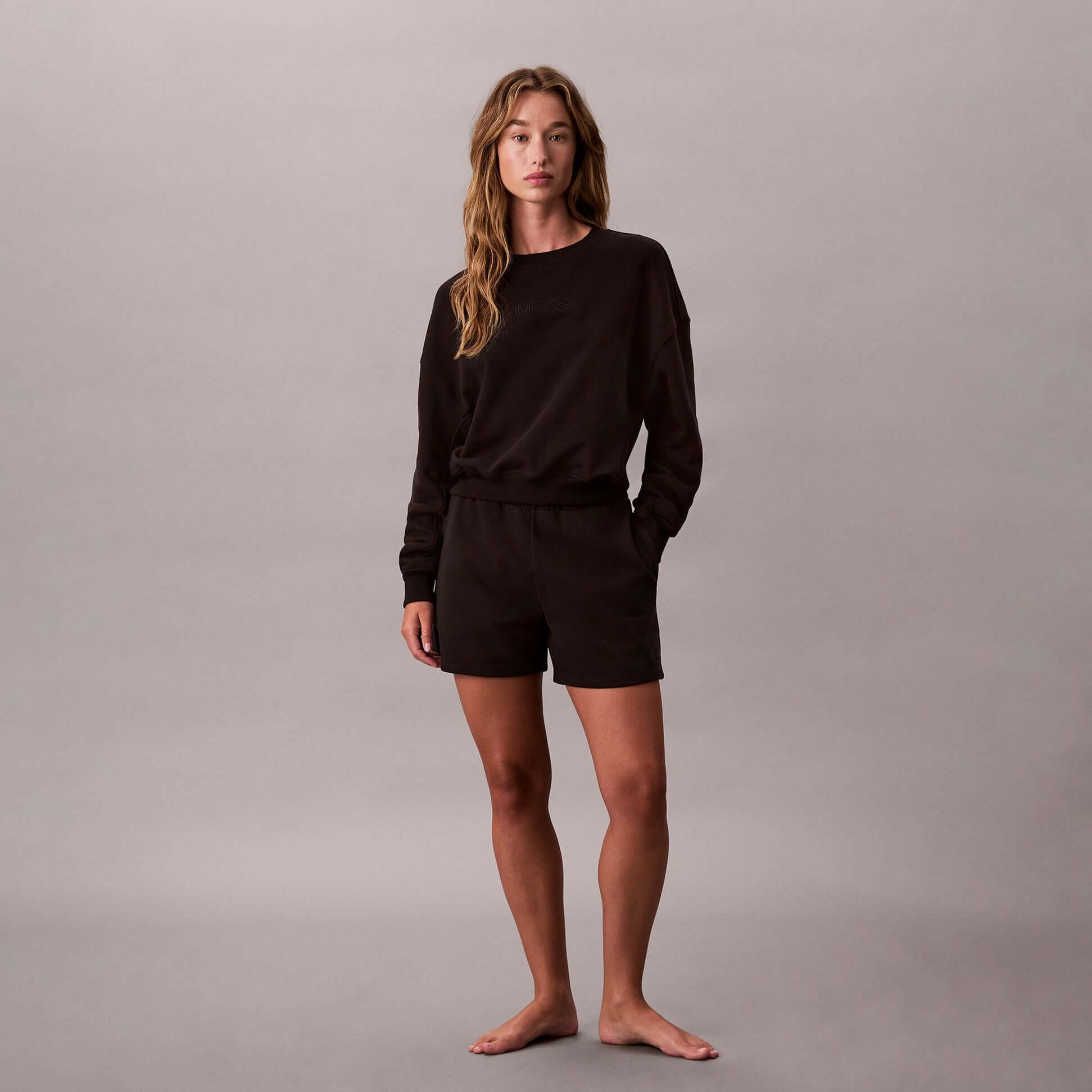 Calvin Klein Womens Long Sleeve Pyjama Top Black front view showcasing a stylish, comfortable design in soft fabric.