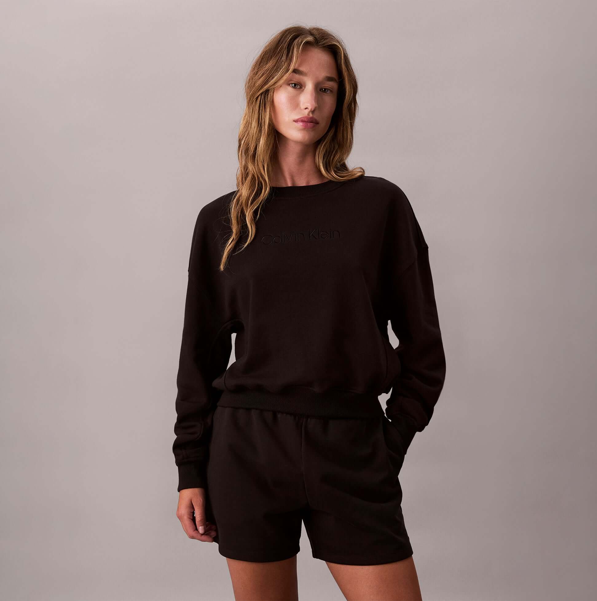Calvin Klein Womens Long Sleeve Pyjama Top Black front view showcasing soft cotton blend material and relaxed fit.
