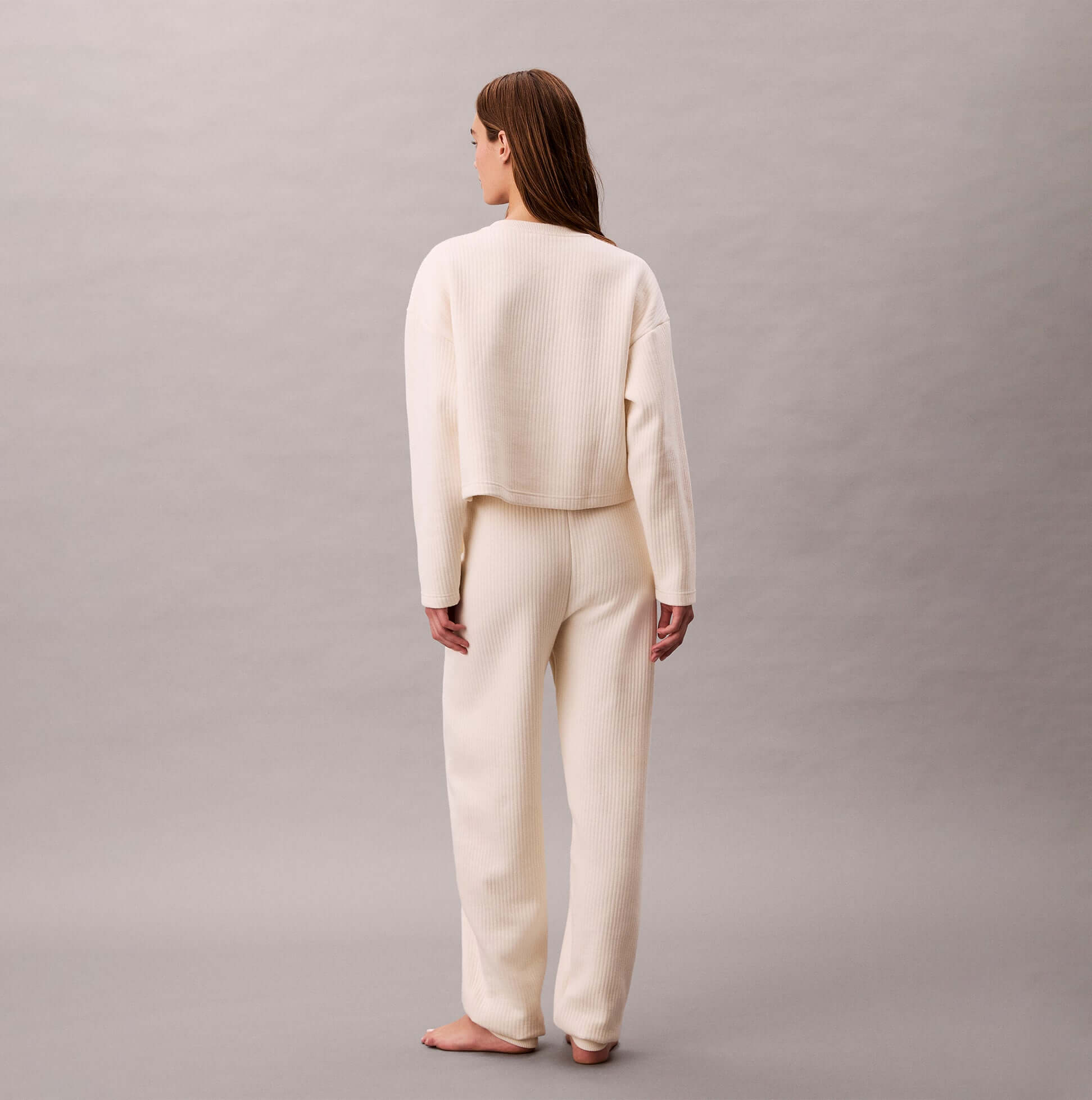 Calvin Klein QUILTED JOGGER Womens Ivory back view, featuring soft cotton-polyester blend and comfortable fit.