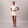 Calvin Klein SEAMLESS SHORTIE Womens Shorts Ivory front view model wearing matching top and shorts.