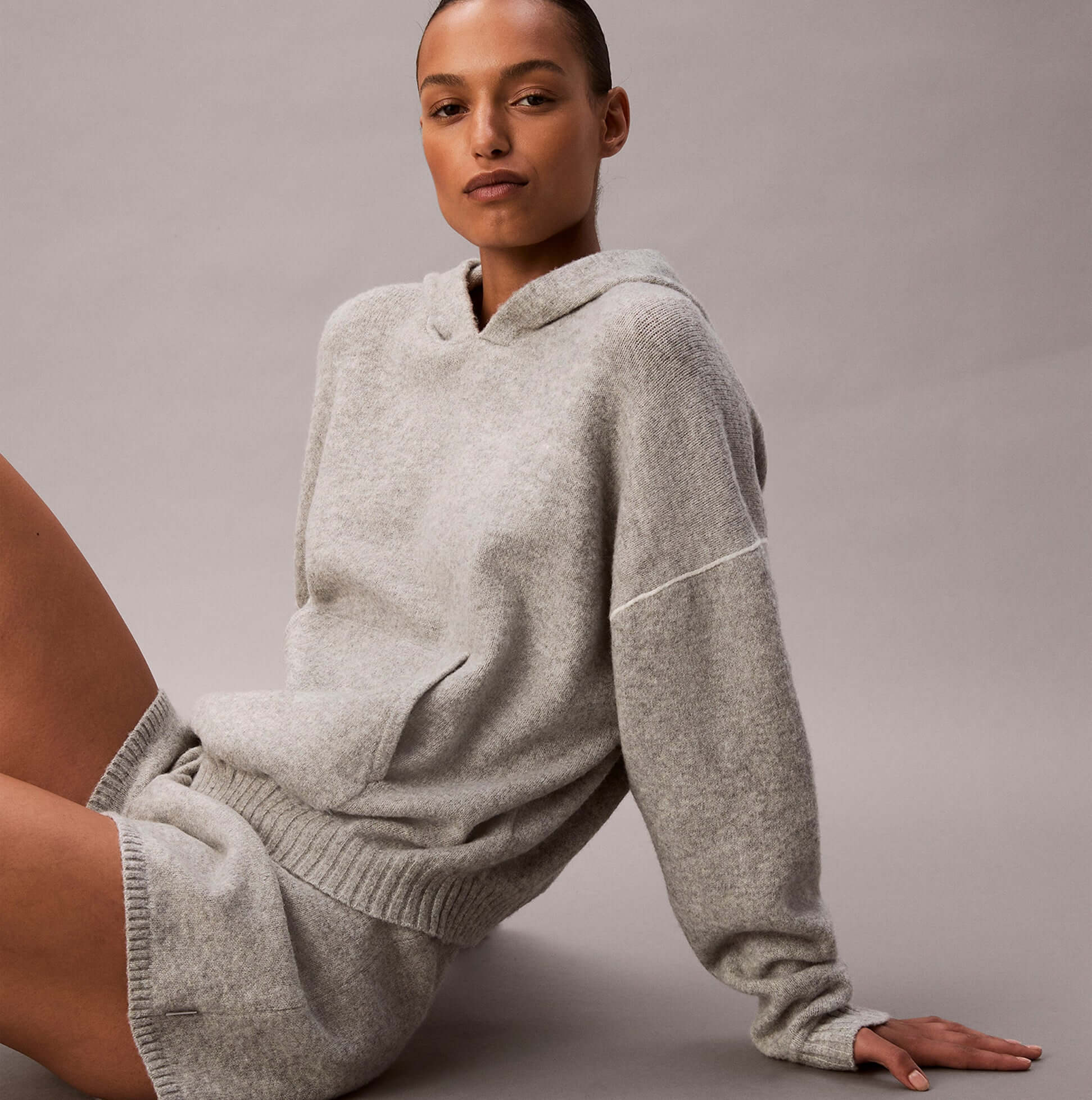 Calvin Klein PLUSH HOODIE. Womens Hoodies Grey Heather, front view showcasing soft fabric and relaxed fit.
