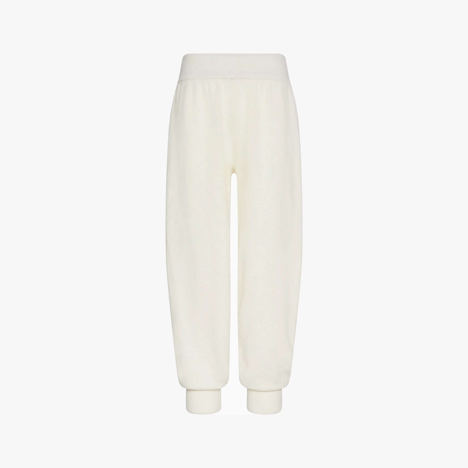 Calvin Klein PLUSH JOGGER. Womens Ivory front view, showcasing soft fabric and relaxed fit.