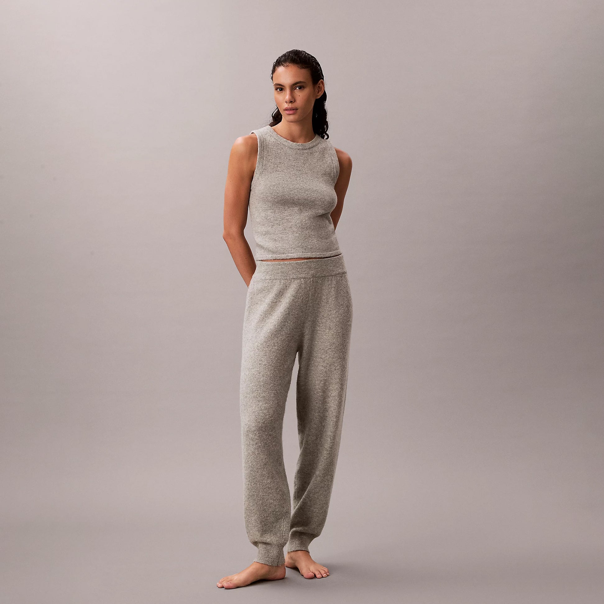 Calvin Klein PLUSH JOGGER. Womens Grey Heather, front view showcasing the soft, stylish joggers and matching top.