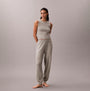 Calvin Klein PLUSH JOGGER. Womens Grey Heather, front view showcasing the soft, stylish joggers and matching top.