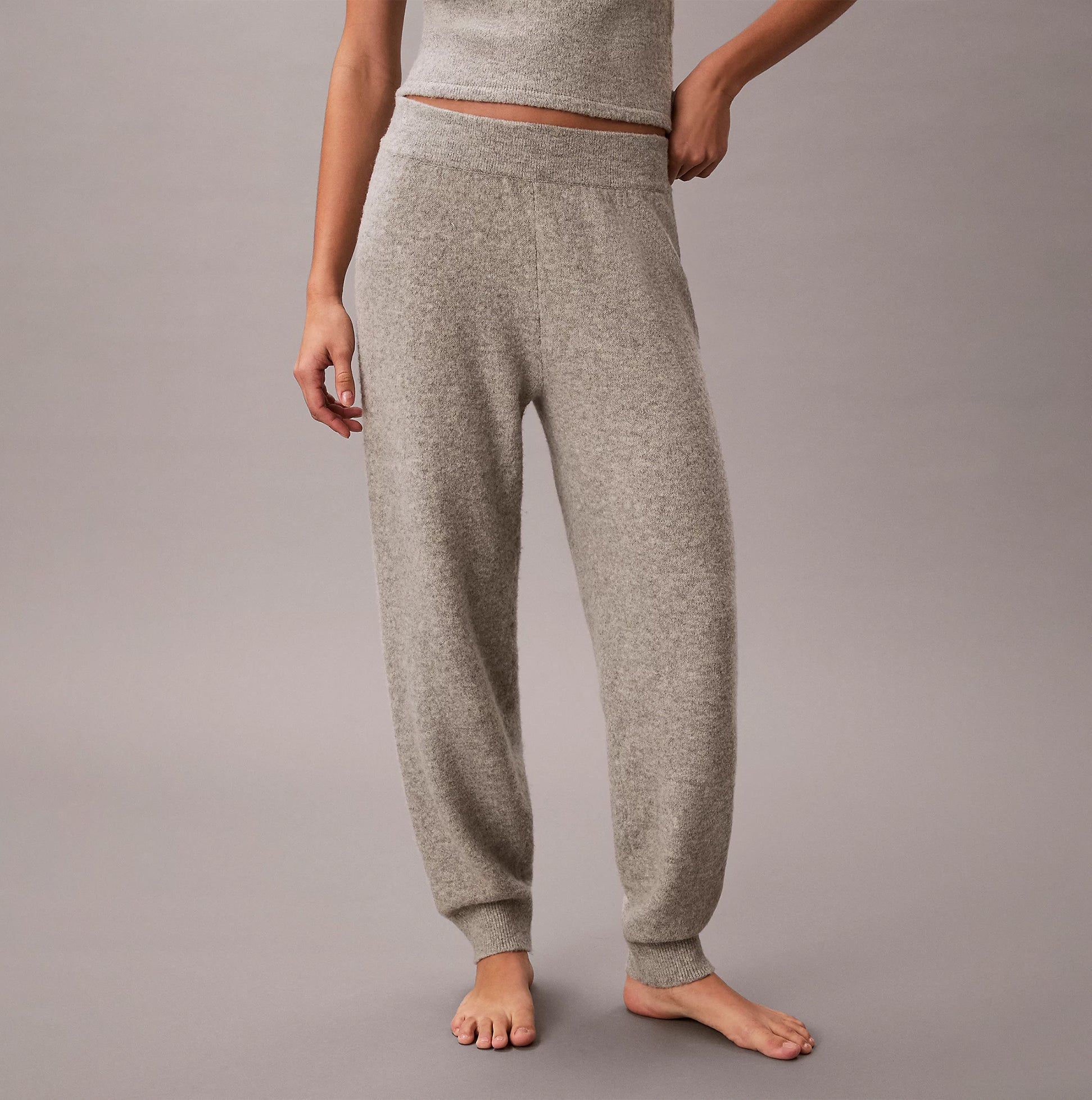 Calvin Klein PLUSH JOGGER. Womens Grey Heather side view showcasing soft texture and fit.