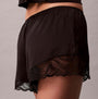 Calvin Klein CAMI SHORT SET Womens Black side view of shorts with lace hem detail.