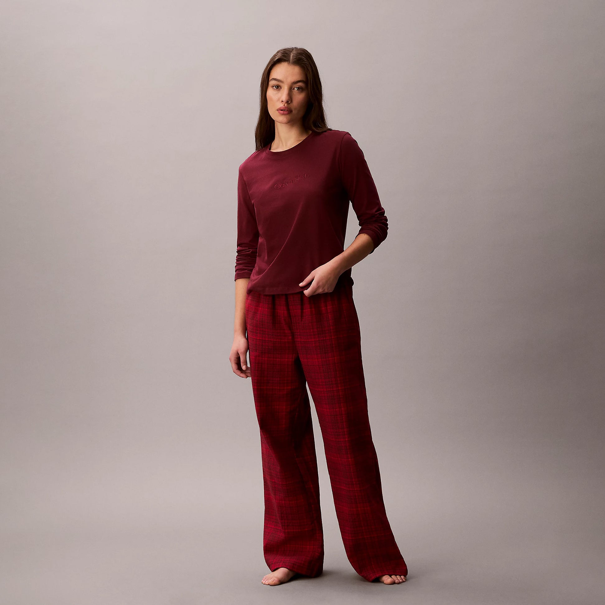 Calvin Klein LS TEE FLANNEL PANT Womens Pant Set Red, front view of model wearing red long sleeve tee and plaid pants.