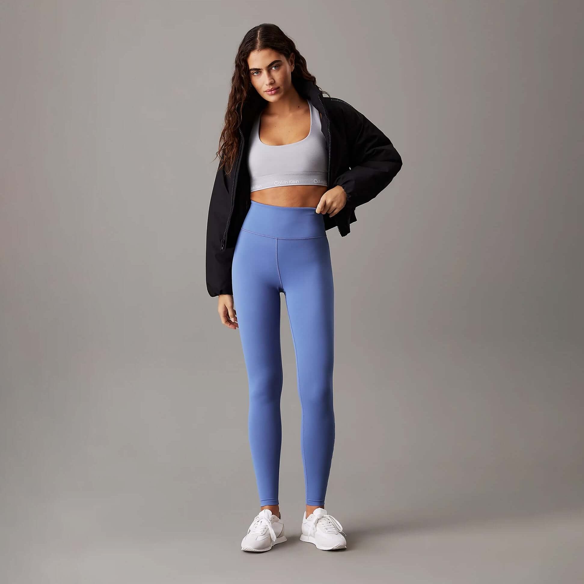 Calvin Klein LEGGING FULL Ladies Full Length Leggings Glacier front view, showcasing a model wearing light blue leggings.