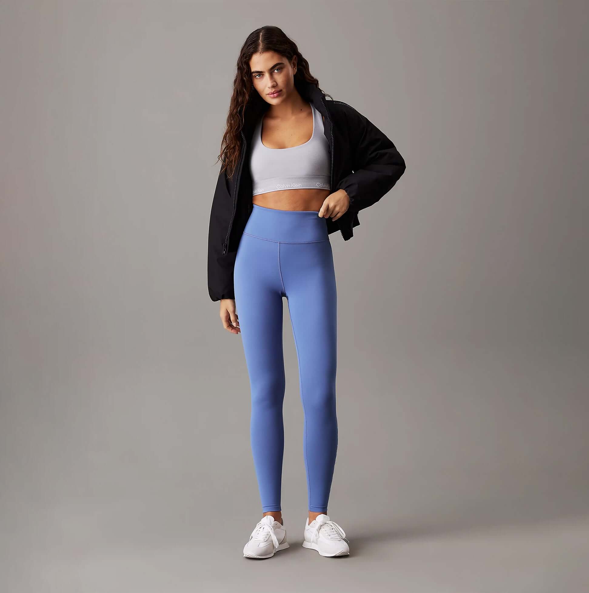 Calvin Klein LEGGING FULL Ladies Full Length Leggings Glacier front view, showcasing a model wearing light blue leggings.