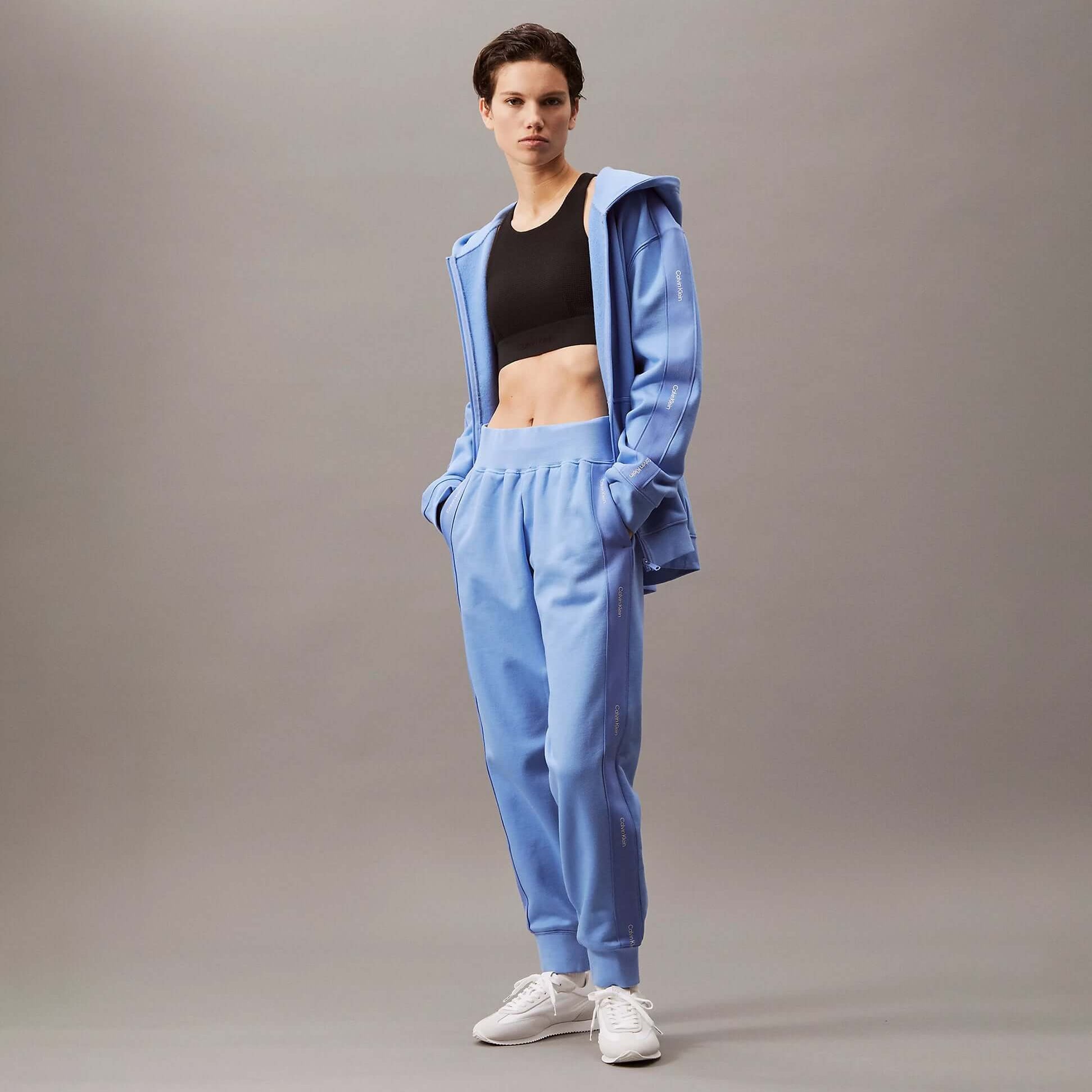 Calvin Klein JOGGER Womens Joggers Glacier front view, light blue joggers paired with a black crop top.