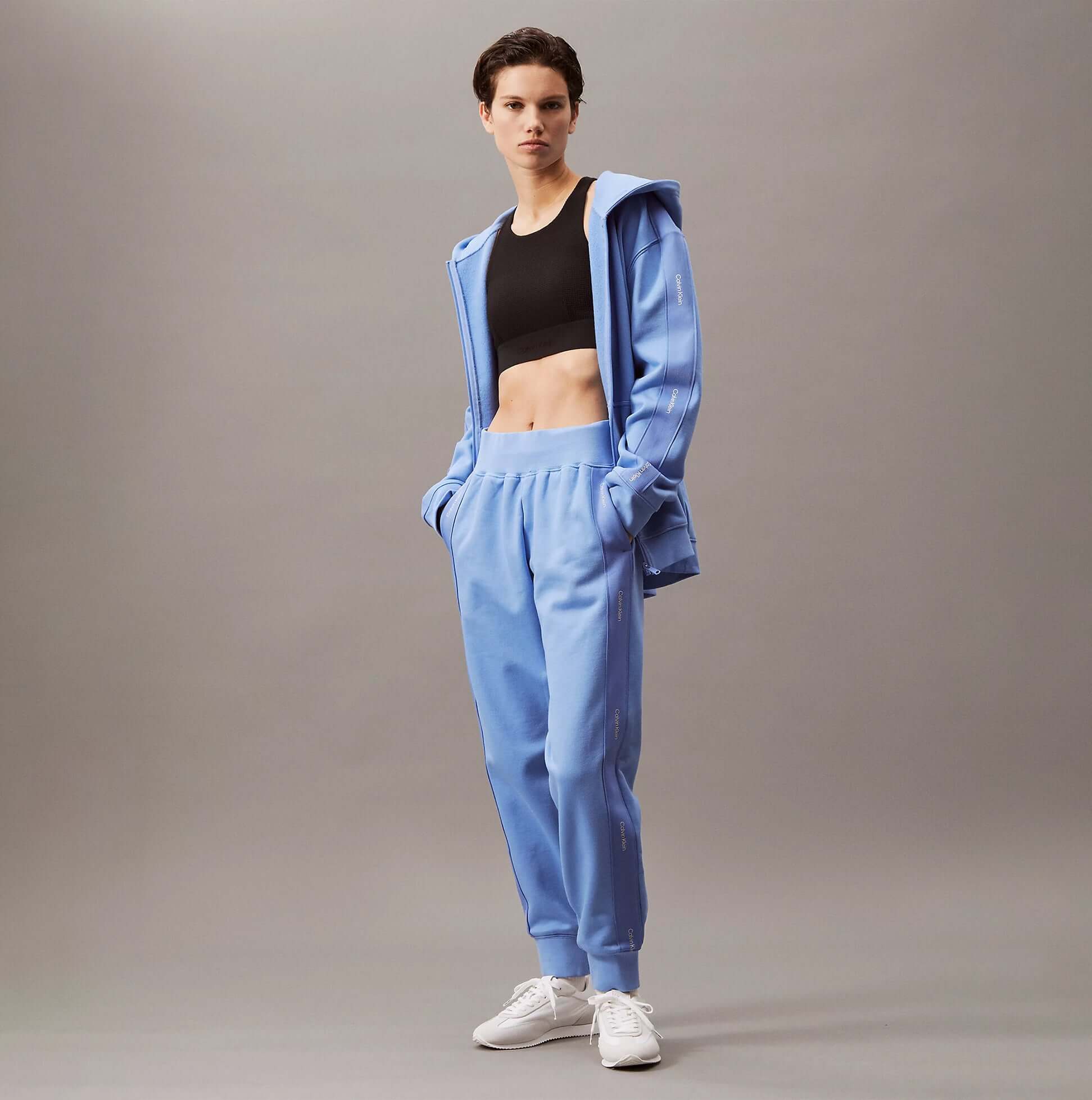 Calvin Klein JOGGER Womens Joggers Glacier front view, light blue joggers paired with a black crop top.