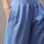 Calvin Klein JOGGER Womens Joggers Glacier detail view showcasing pockets and branding in soft blue fabric.