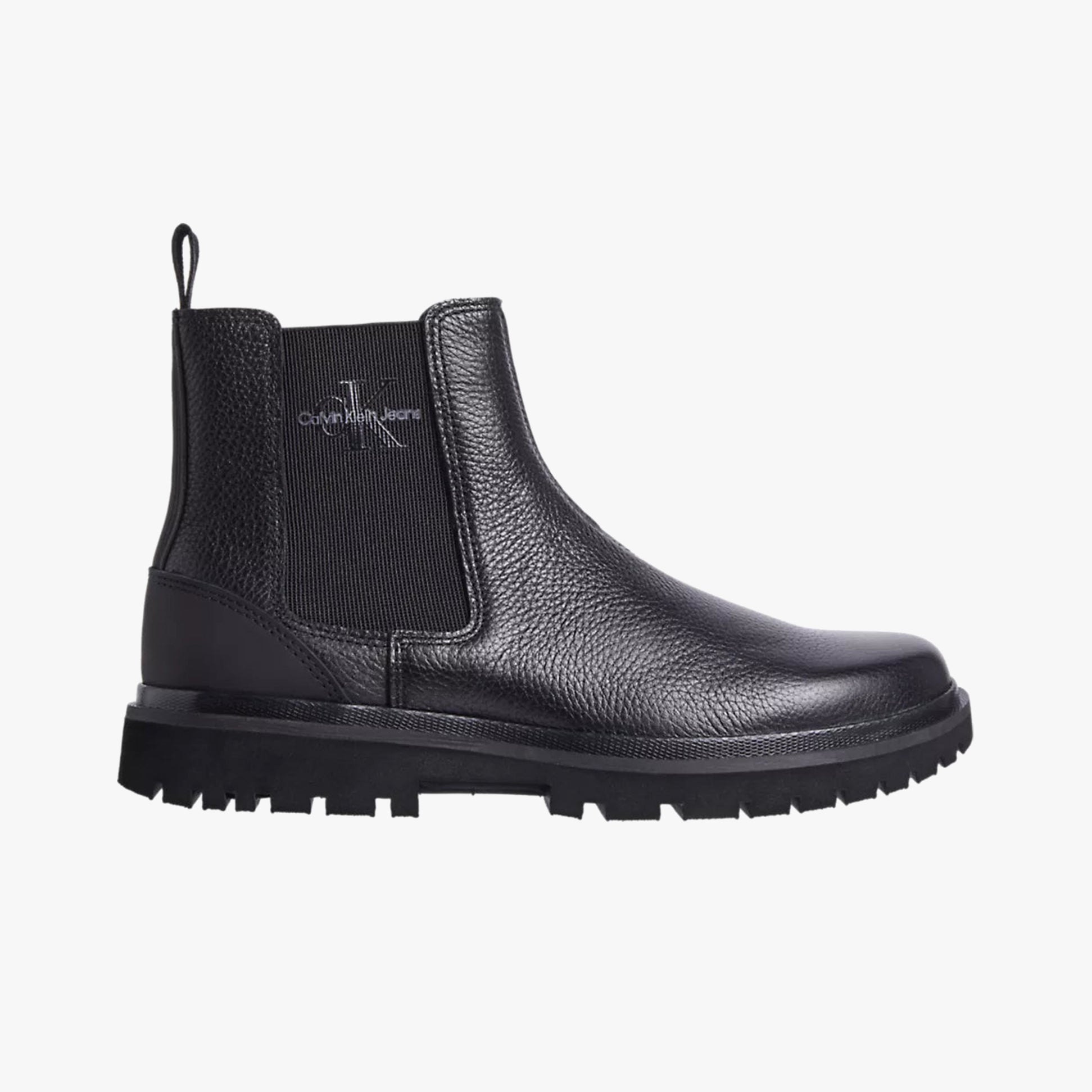 Calvin Klein EVA MID CHELSEA BOOTS Mens Triple Black side view showcasing leather upper and rubber sole.