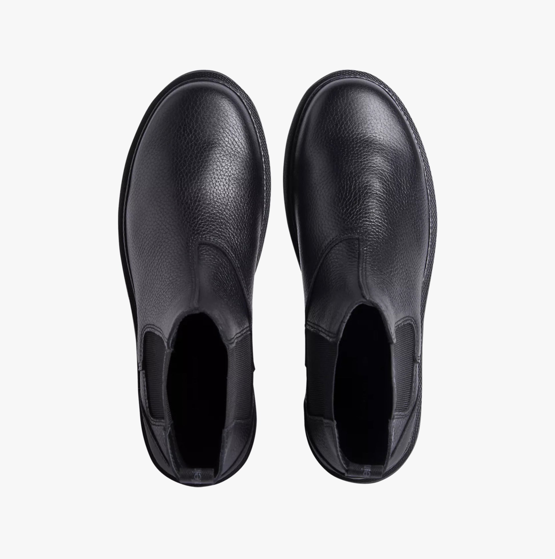 Calvin Klein EVA MID CHELSEA BOOTS Mens Triple Black top view showing leather upper and slip-on design.