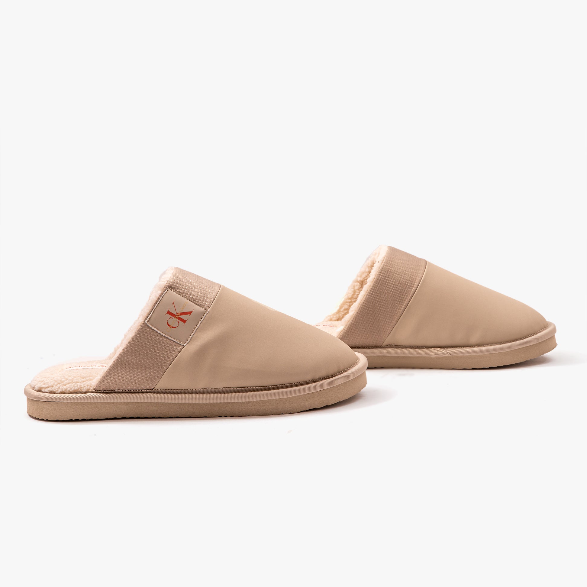 Calvin Klein HOME CLOG SURFACES Mens Slippers Taupe side view showing lightweight design and slip-on closure.