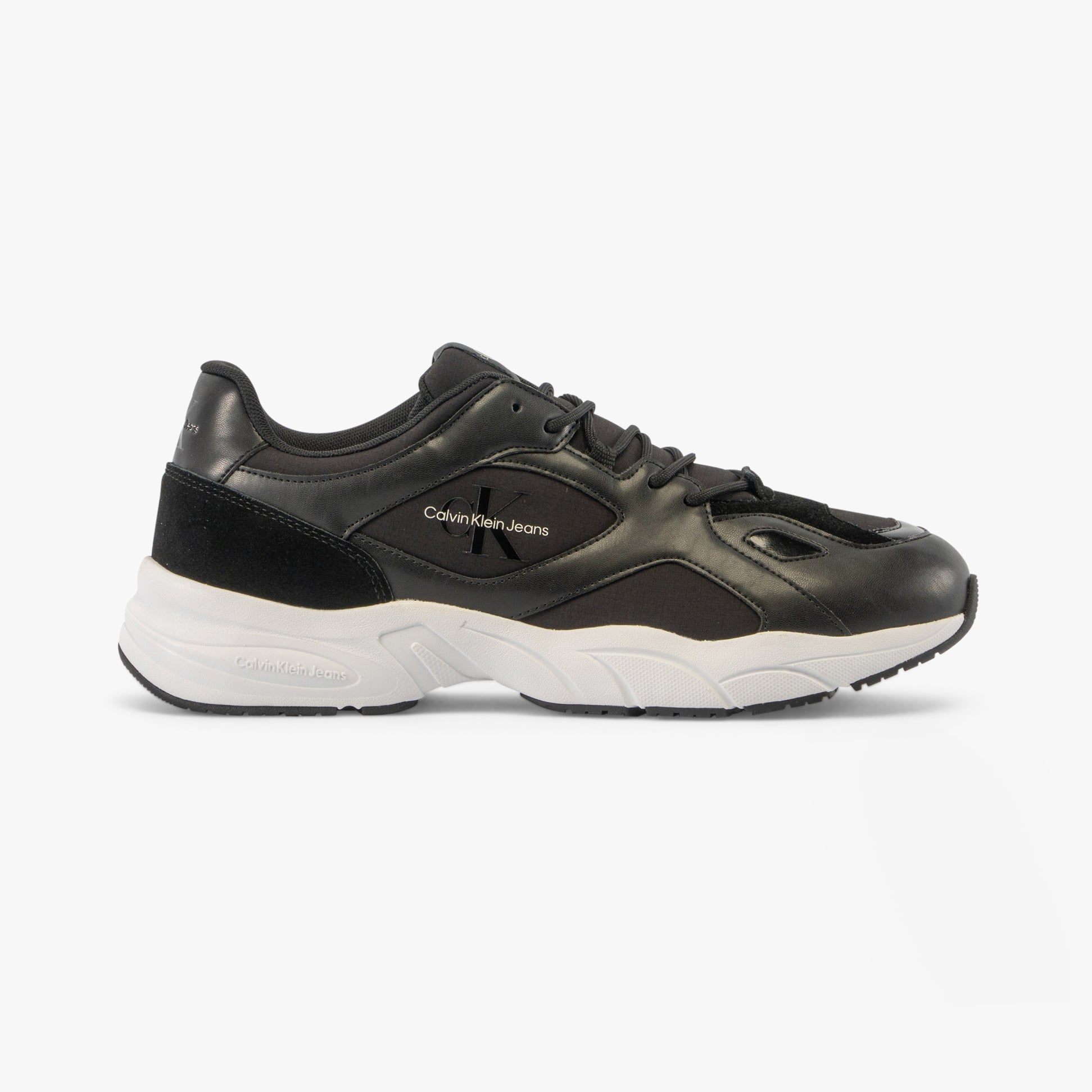 Calvin Klein RETRO TENNIS Mens Trainers Black/Black/Eggshell side view featuring leather upper and rubber sole.