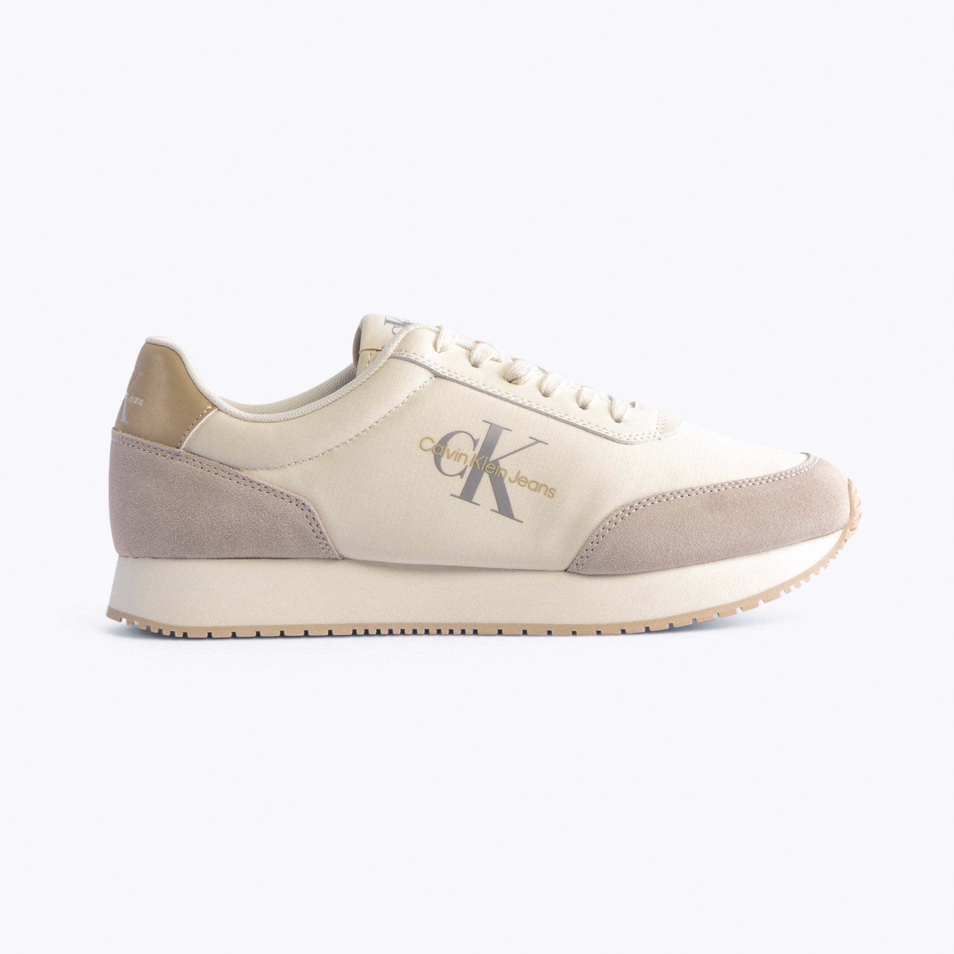 Calvin Klein RETRO RUNNER LOW MIX Mens Trainers Creamy White/Eggshell/Khaki side view showing casual style and leather/suede materials.