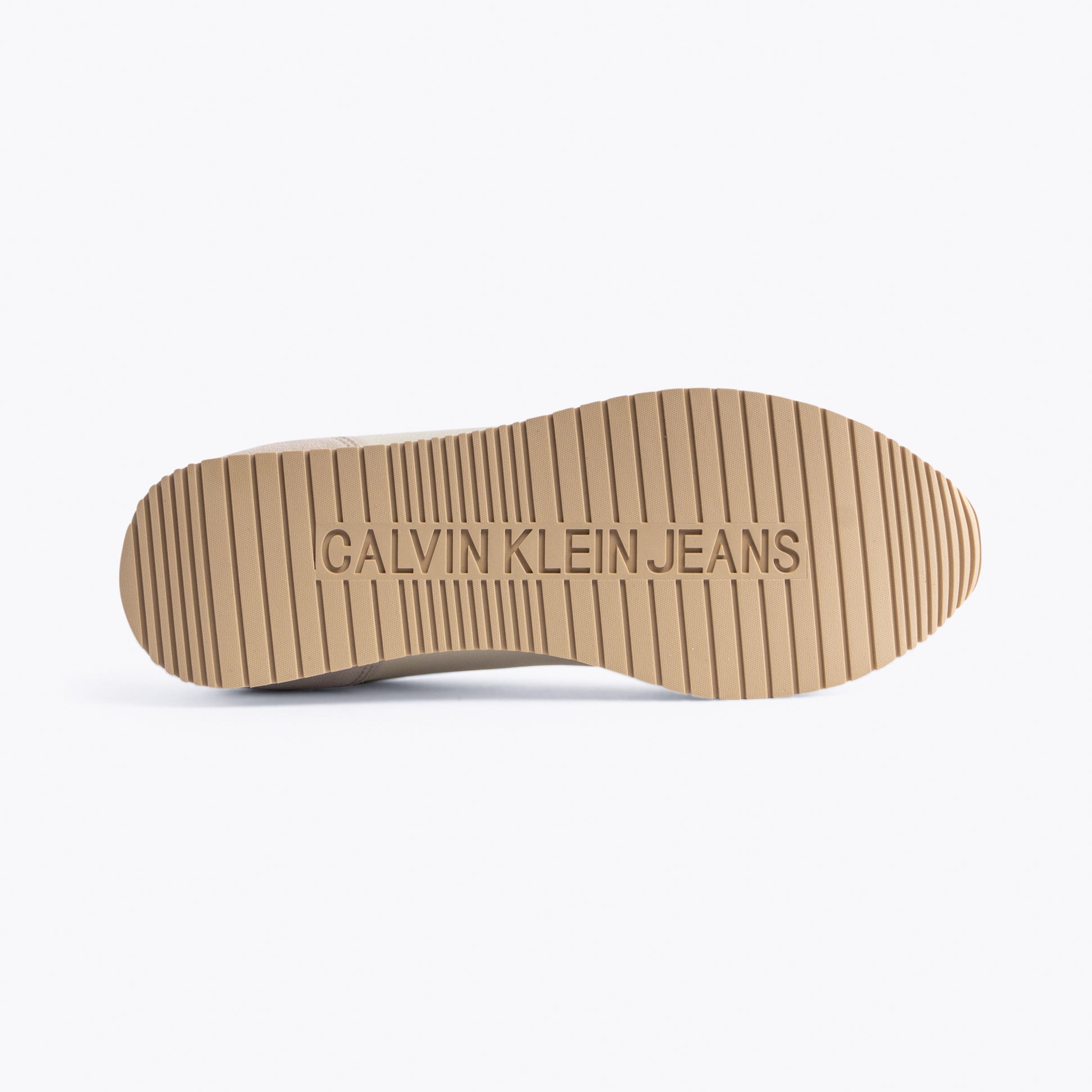 Calvin Klein RETRO RUNNER LOW MIX Mens Trainers Creamy White/Eggshell/Khaki sole view with embossed CALVIN KLEIN JEANS logo.