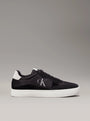 Calvin Klein CLASSIC CUPSOLE ICON Mens Trainers Black/Bright White, side view showcasing suede upper and lace-up design.