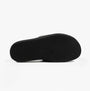 Calvin Klein FLAT MOLDED SLIDE Mens Triple Black bottom view showing the textured EVA sole with logo detail.