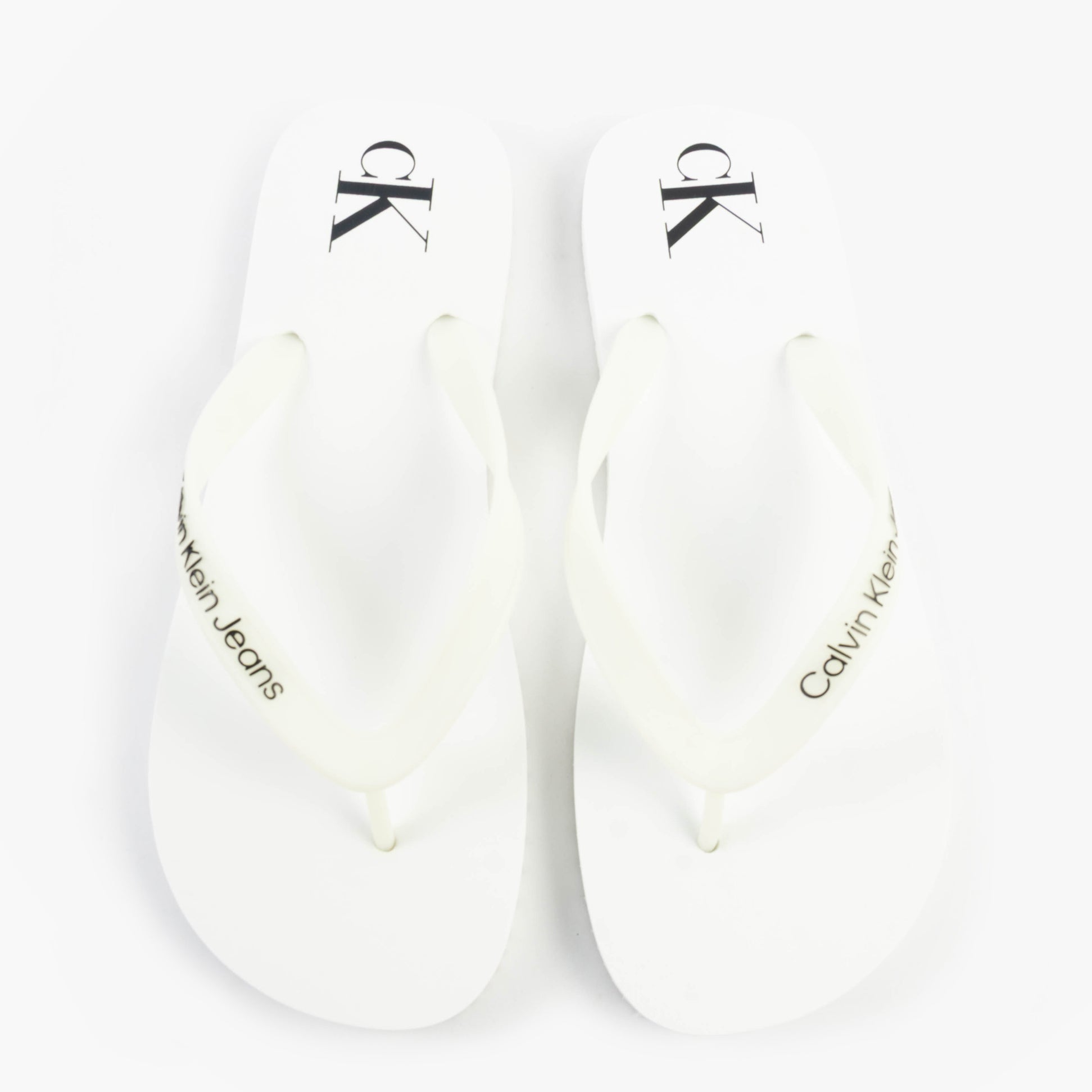 Calvin Klein BEACH SANDAL TRANSPA Mens Sandals Bright White/Black top view showing logo and detail of the sandals.