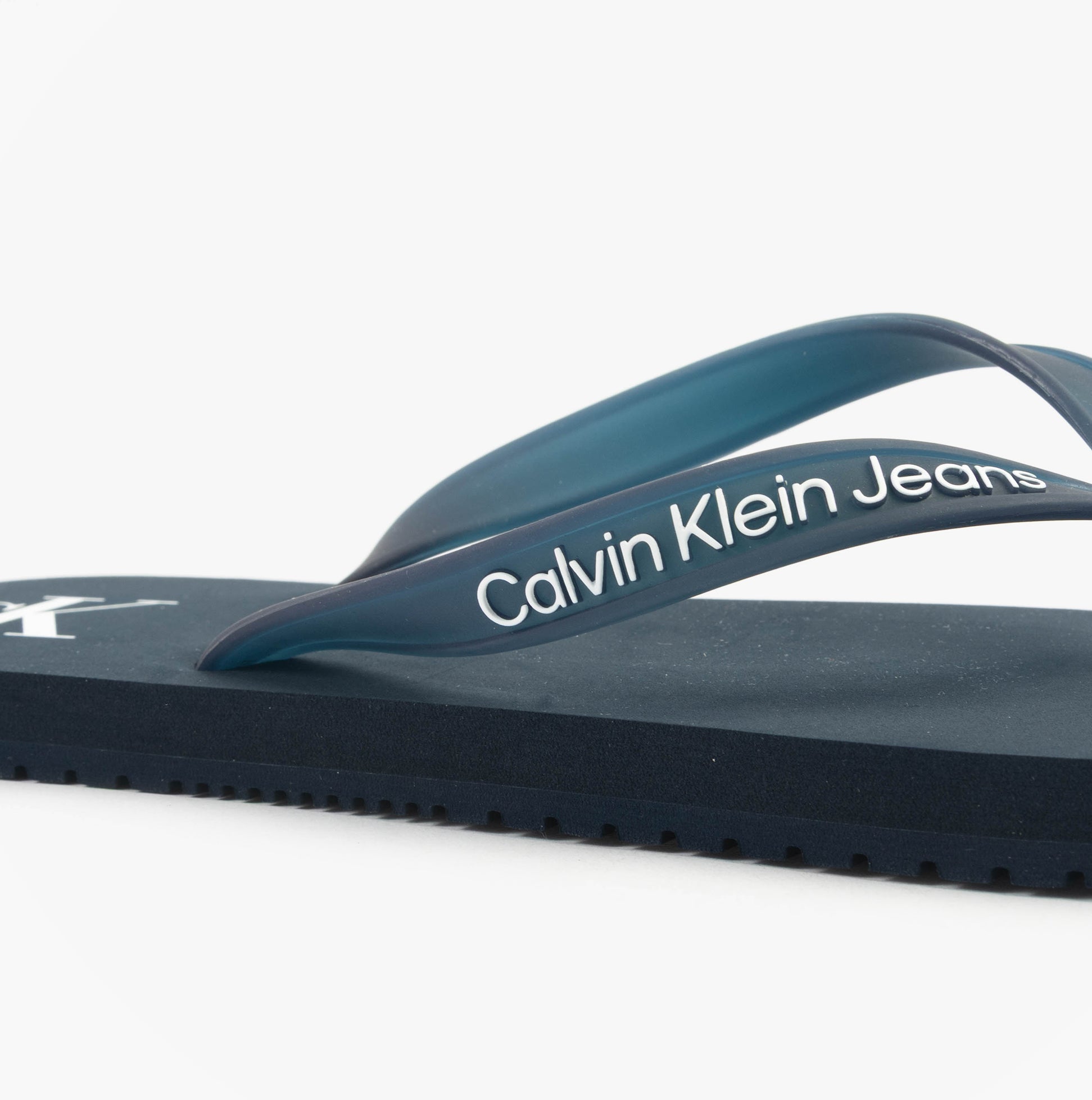 Calvin Klein BEACH SANDAL TRANSPA Mens Sandals Calvin Navy/Bright White side view showing straps and sole detail.