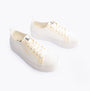 Calvin Klein BOLD VULCANISED Womens Trainers Creamy White/White/Whisper Pink side view showcasing lace-up design and platform sole.