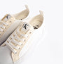 Calvin Klein BOLD VULCANISED Womens Trainers Creamy White/White/Whisper Pink, top detail view showcasing lace-up design.