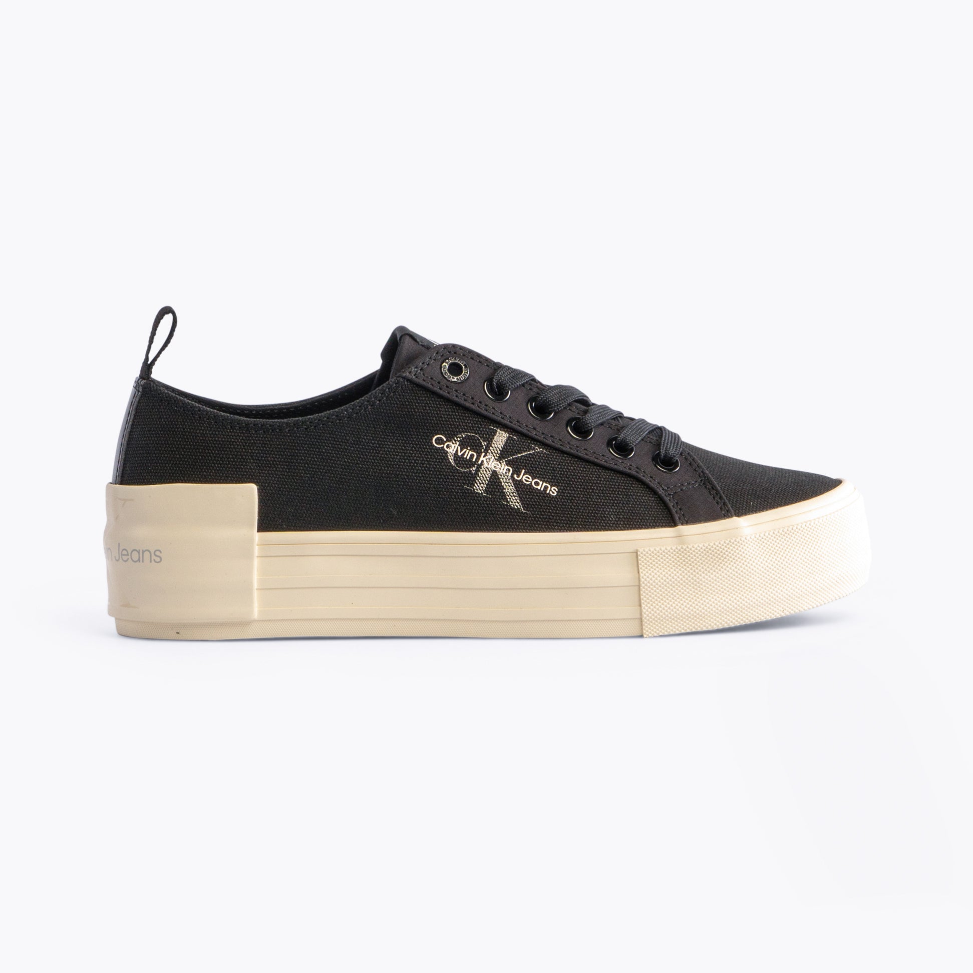 Calvin Klein BOLD VULCANISED Womens Trainers Black/Creamy White side view with platform sole and lace-up design.