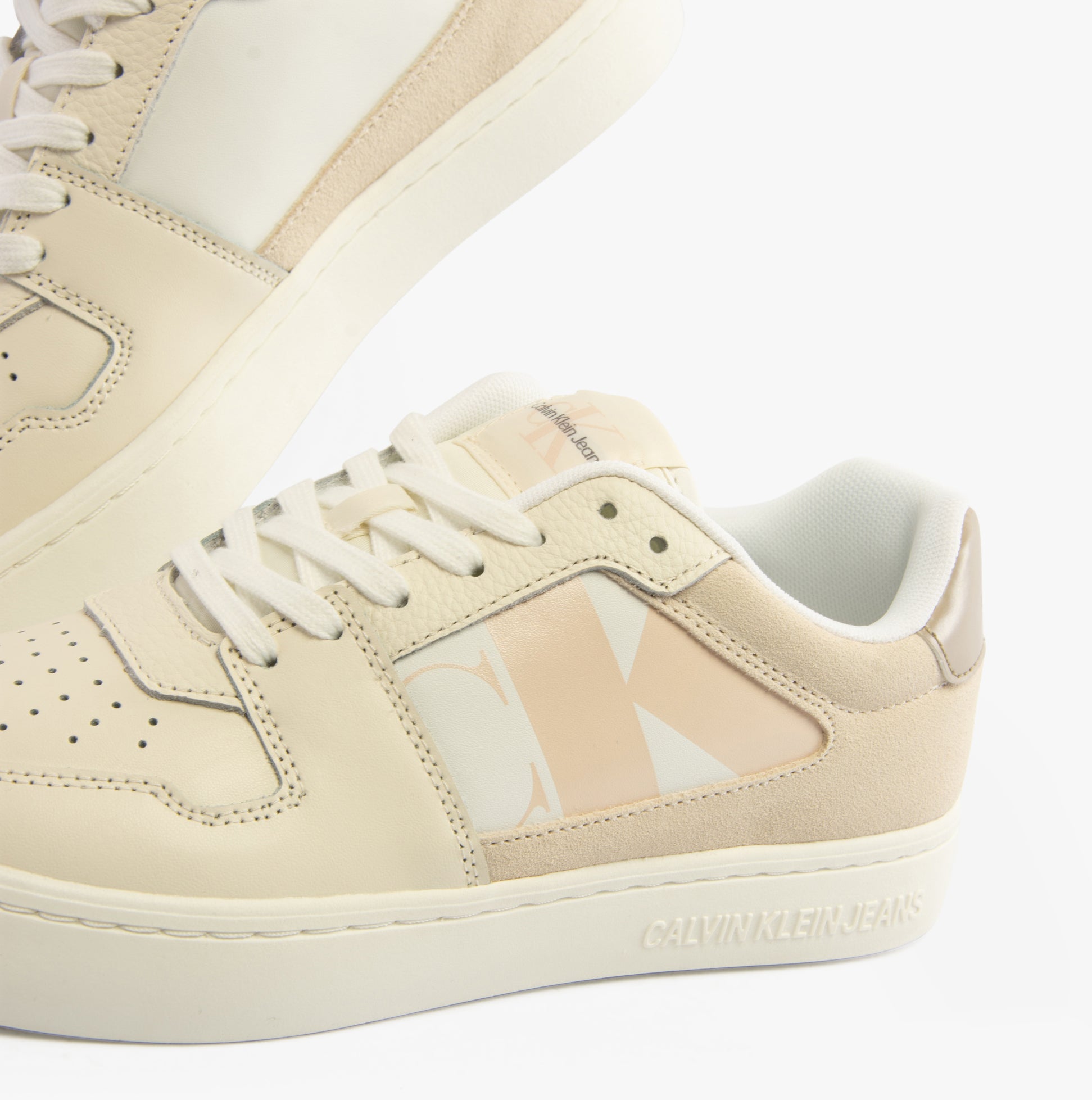 Calvin Klein CLASSIC CUPSOLE Womens Trainers Bright White/Travertine/W Pink side view showcasing leather and suede materials.