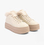 Calvin Klein BOLD PLATFORM LOW LACE UP Womens Trainers Eggshell/Savannah Tan front view with plush collar and platform sole.