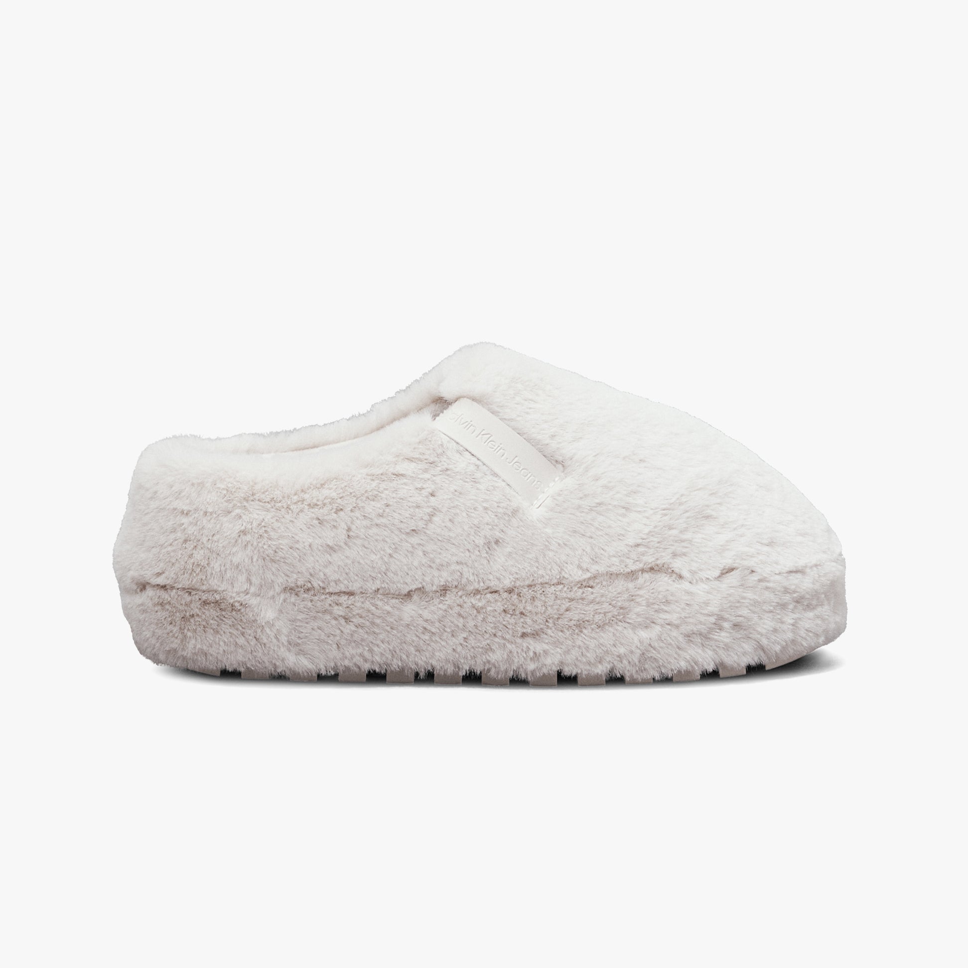 Calvin Klein HOME ANKLE Womens Slippers Triple Eggshell side view of cozy faux fur slippers with round toe and slip-on design.