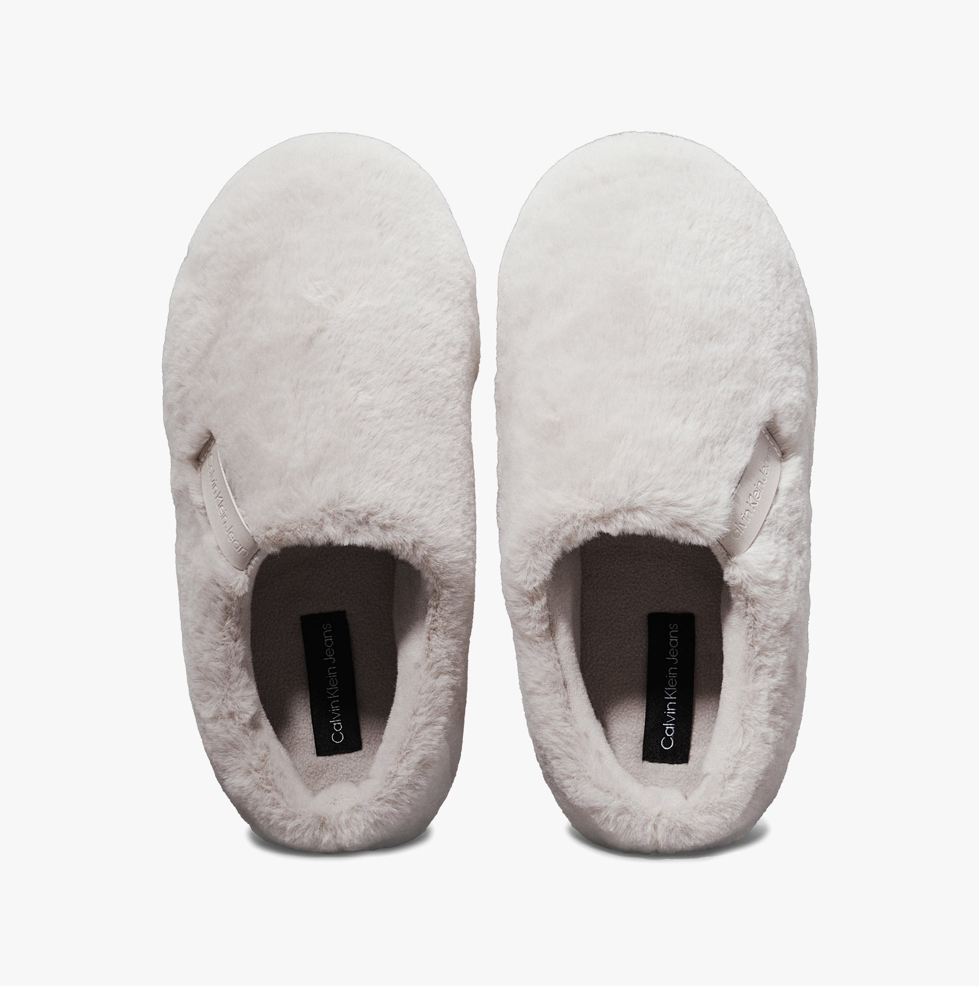Calvin Klein HOME ANKLE Womens Slippers Triple Eggshell top view showcasing soft faux fur material and round toe design.
