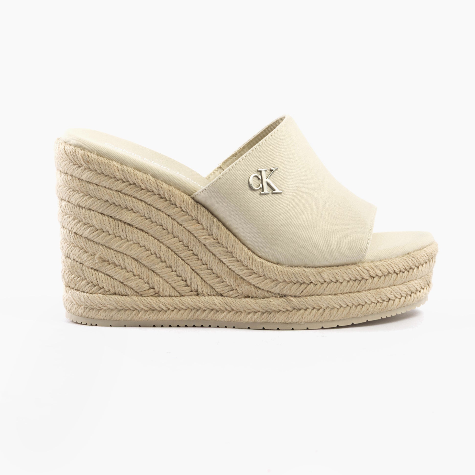 Calvin Klein WEDGE ROPE Womens Sandals Turtle Dove side view showcasing wedge heel and canvas upper.