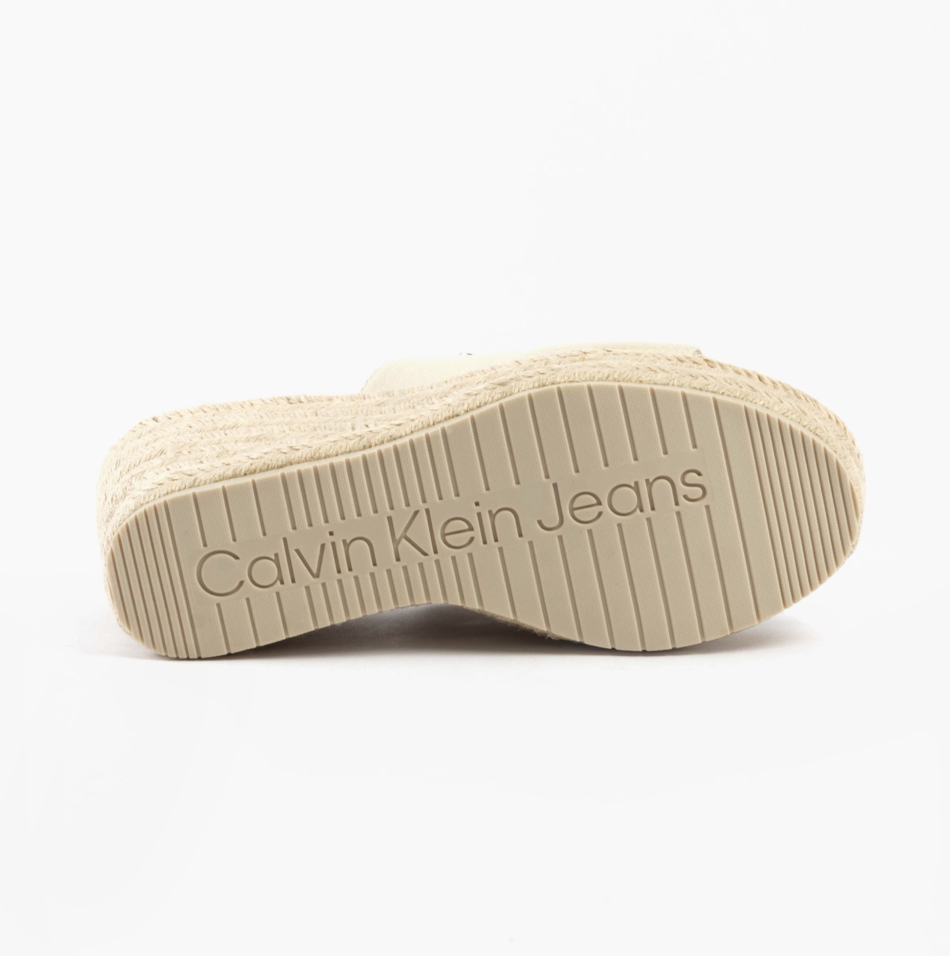 Calvin Klein WEDGE ROPE Womens Sandals Turtle Dove bottom view showing the TPR sole with embossed logo.