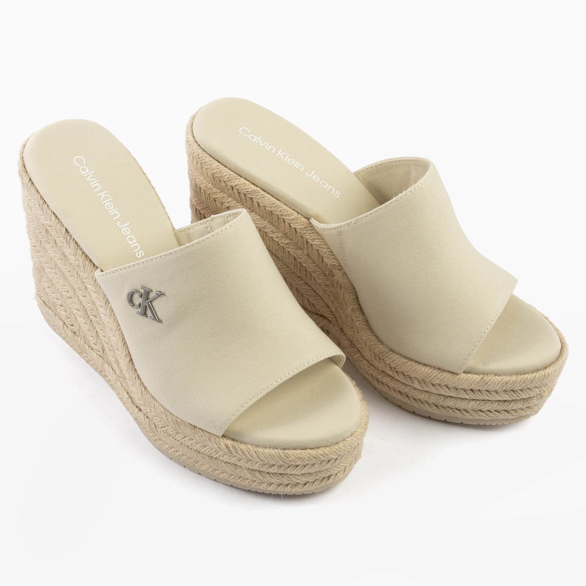 Calvin Klein WEDGE ROPE Womens Sandals Turtle Dove side view showing wedge heel and canvas upper details.