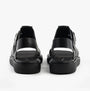 Calvin Klein LEATHER FISHERMAN Womens Sandals Triple Black rear view, showcasing the sleek leather design and buckle closure.