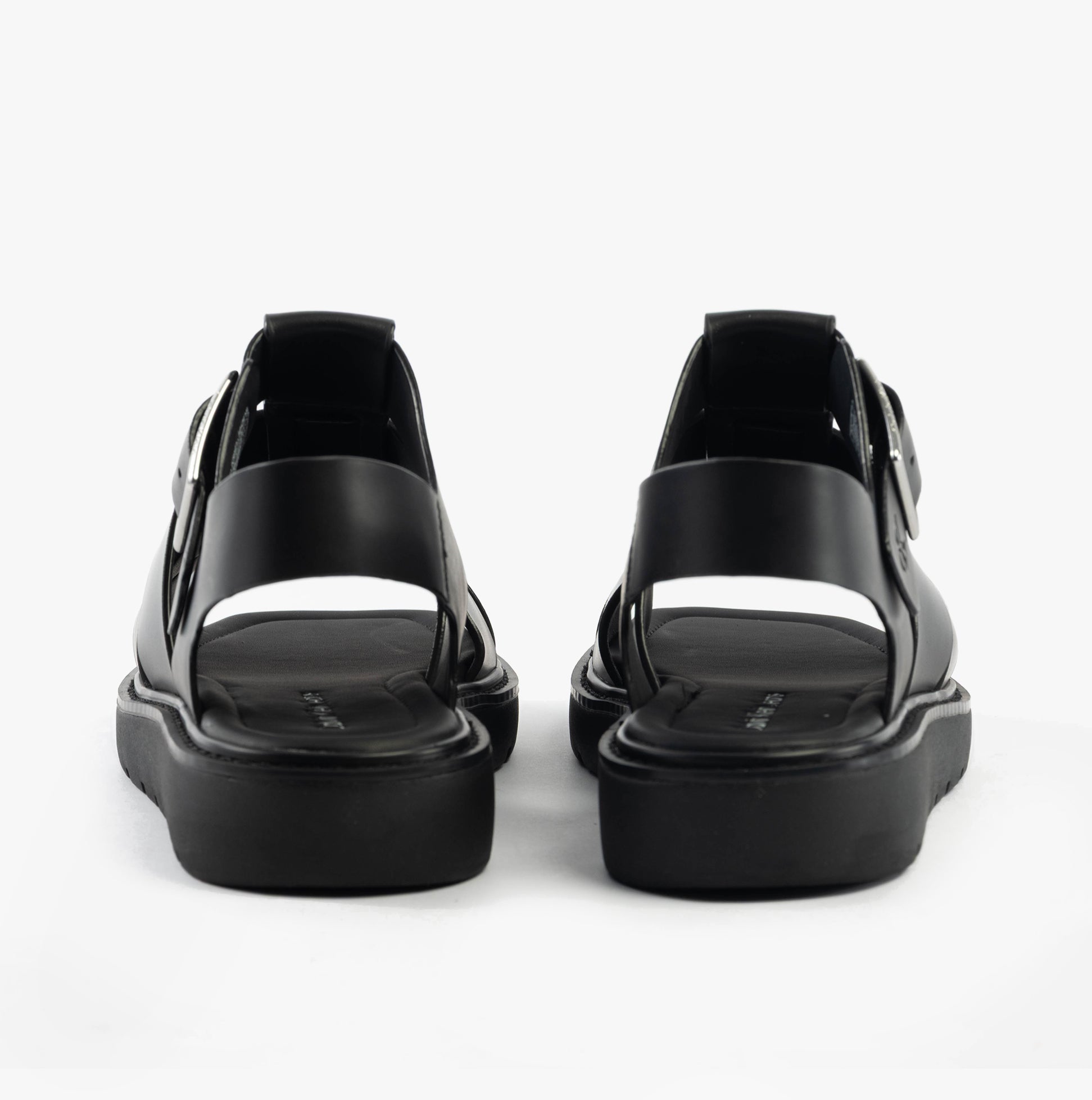 Calvin Klein LEATHER FISHERMAN Womens Sandals Triple Black rear view, showcasing the sleek leather design and buckle closure.