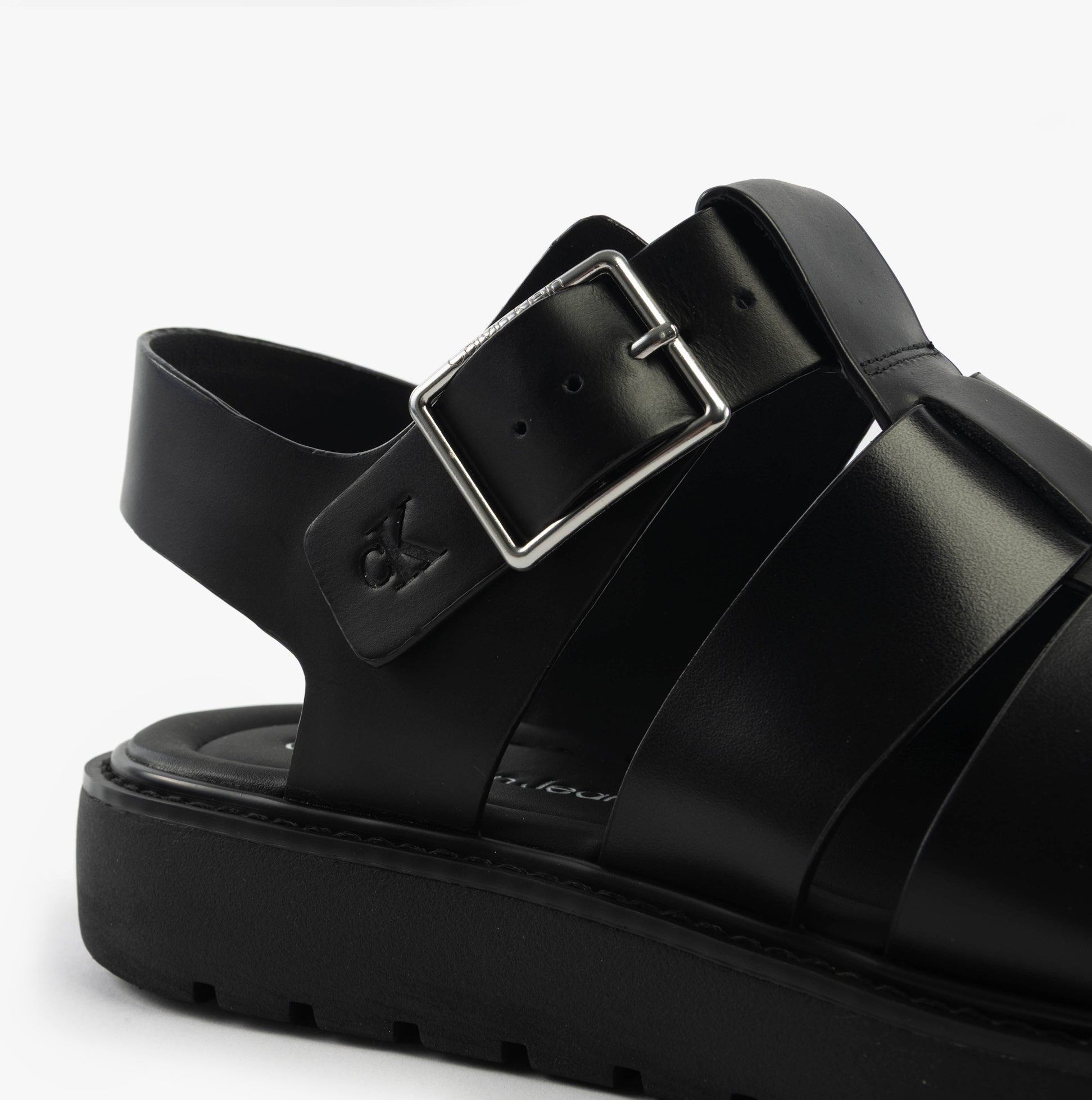 Calvin Klein LEATHER FISHERMAN Womens Sandals Triple Black side view highlighting buckle and leather detail.
